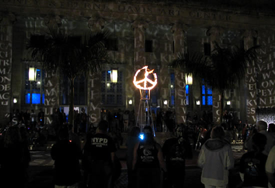 Flipping Flaming Peace Sign Lighting Davis Arts Center